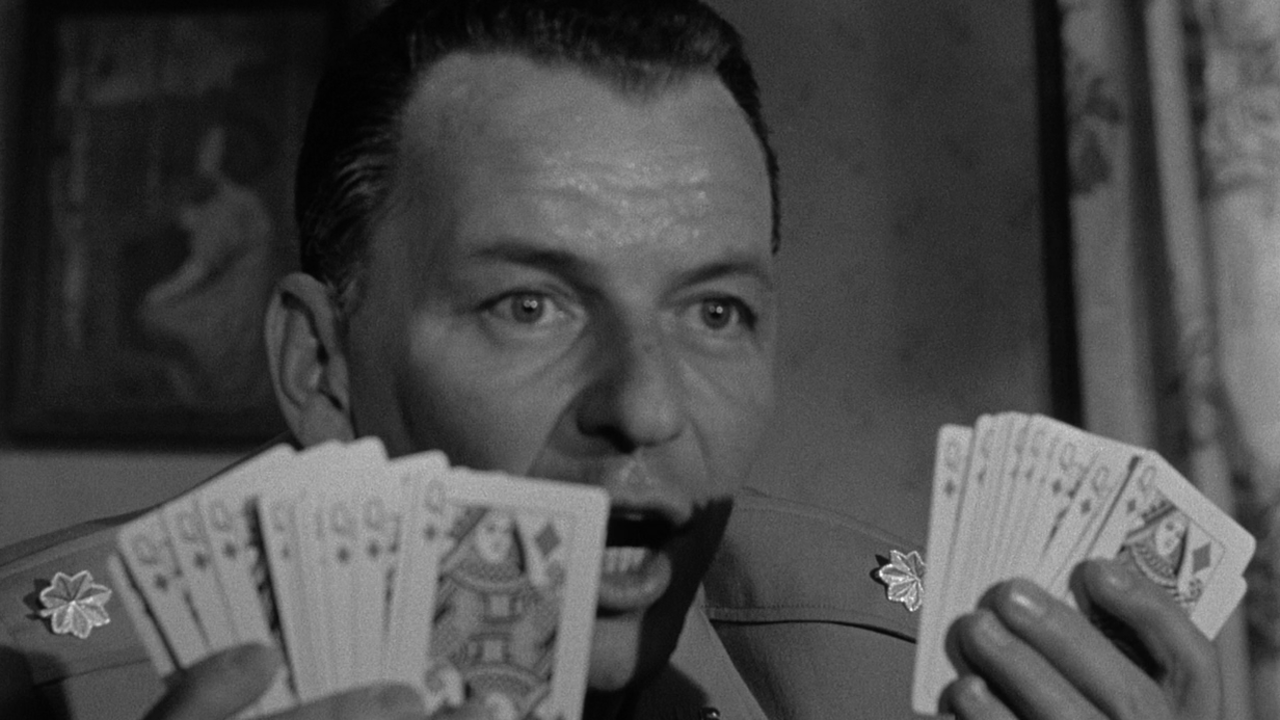 A sweaty Frank Sinatra uses the Queen of Diamonds exploit.